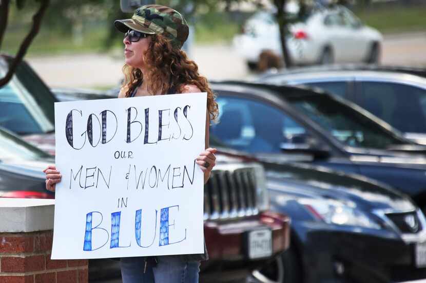 Rachel Hawkins showed support  for police officers Wednesday outside McKinney Police...