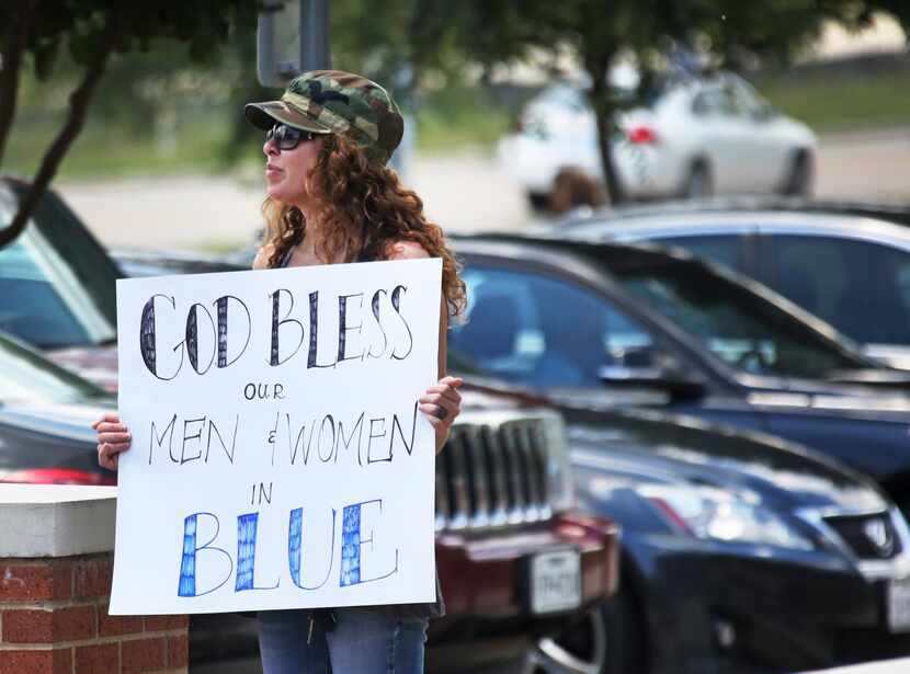 Rachel Hawkins showed support  for police officers Wednesday outside McKinney Police...