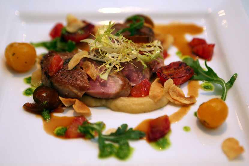 Seared duck breast is shown at Urbano Cafe in Dallas, Texas, Wednesday, February 11, 2015.