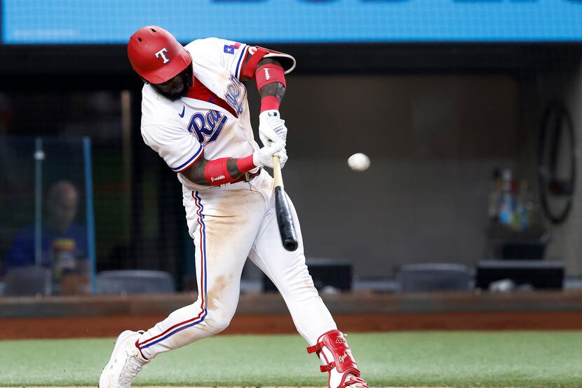 Texas Rangers batter Adolis Garcia connects on a two-run homer, a new Rangers rookie record...