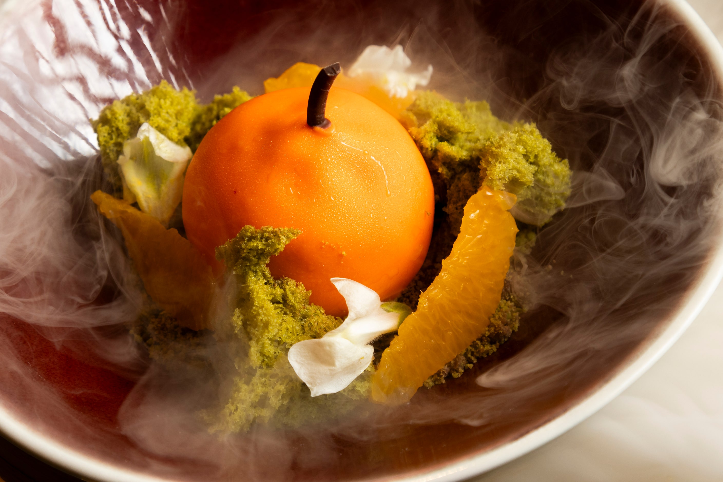 It looks like a pumpkin, but the dessert Mandarin Fields is actually white chocolate...