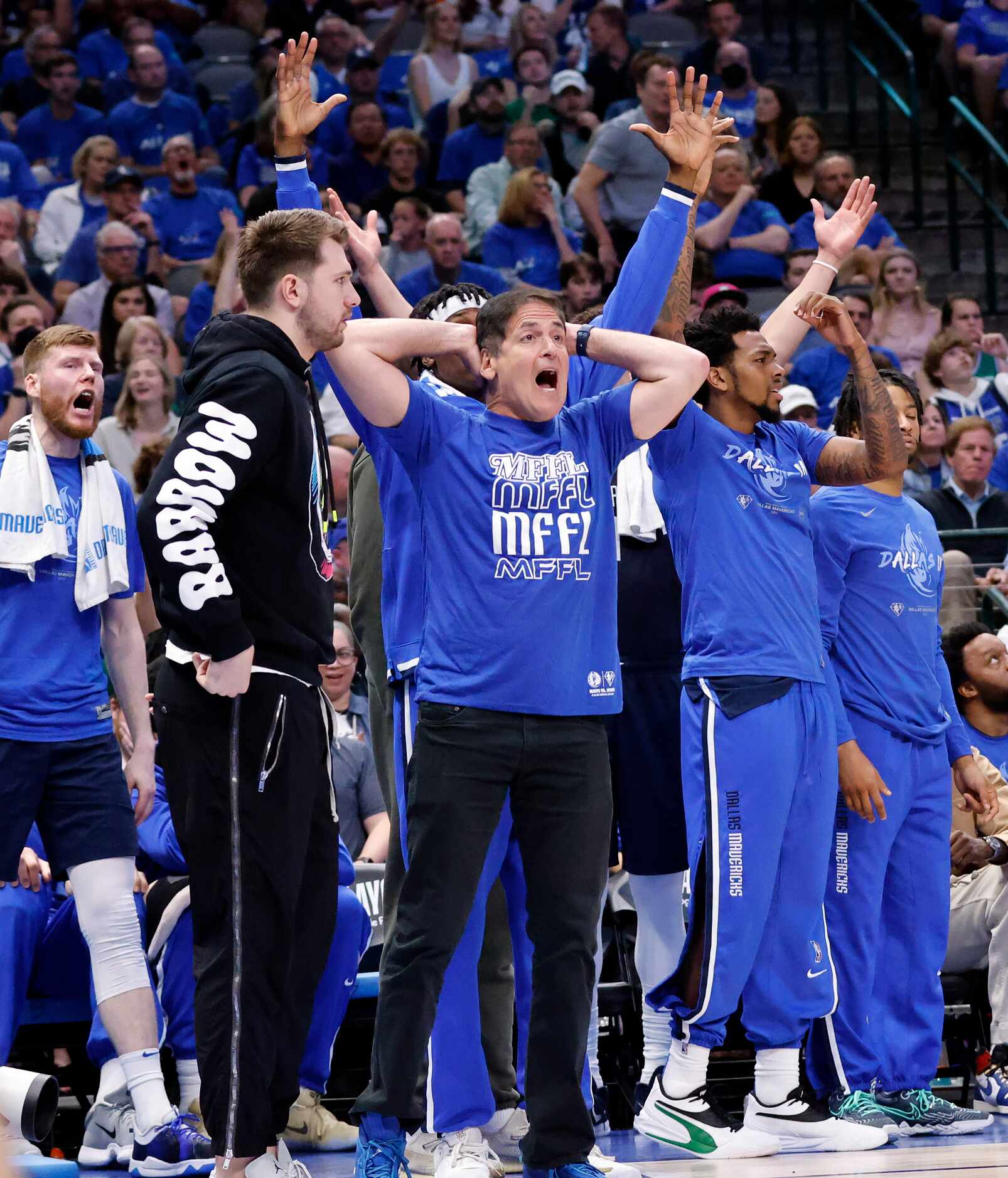 Dallas Mavericks oner Mark Cuban reacts to a called foul on his team during the first half...
