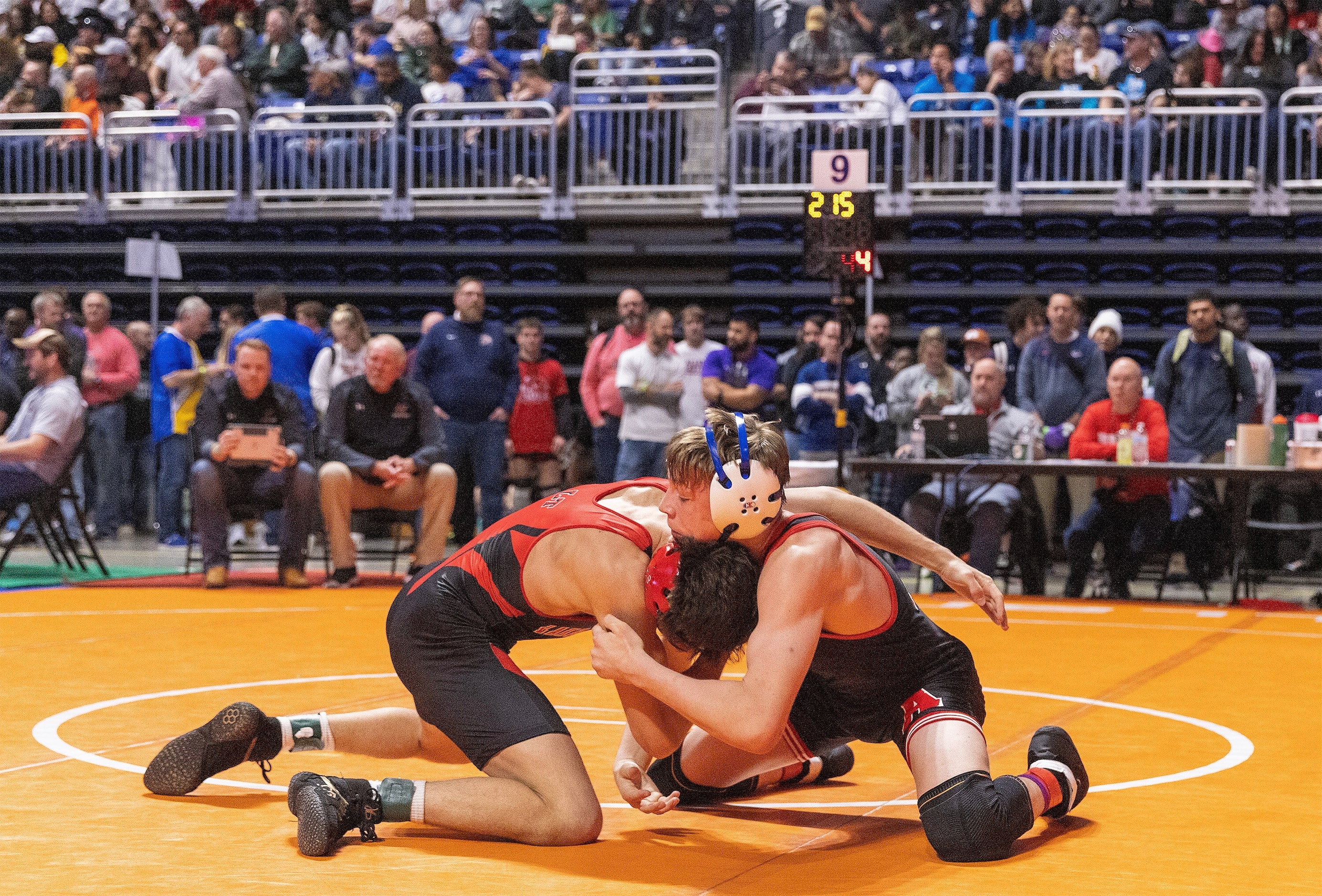 Joseph Liescheski from Allen (right) wrestles Will Deutschlander from Austin Lake Travis in...