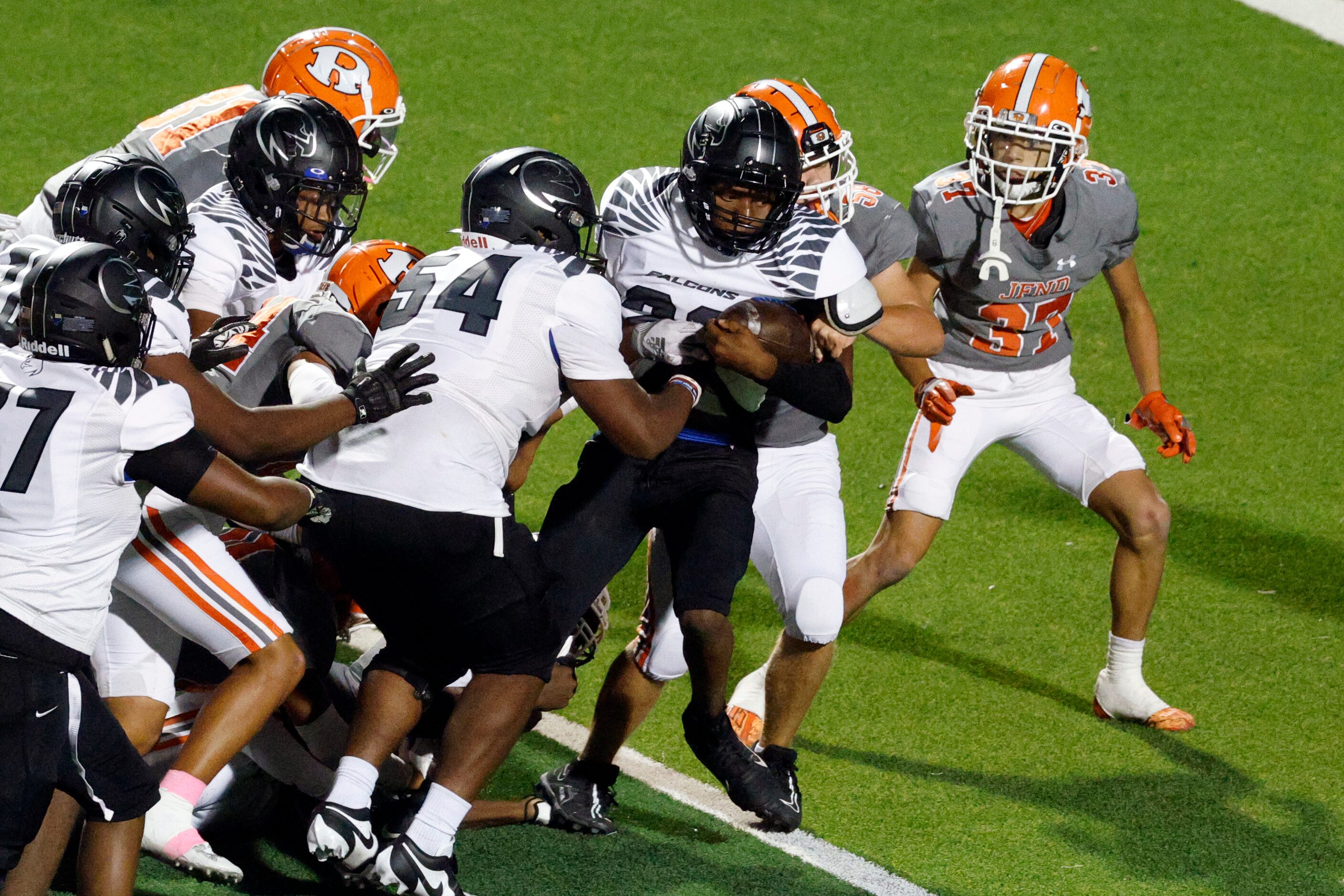 North Forney running back Rozier Burns (23) forces his way inside the 5-yard line during the...