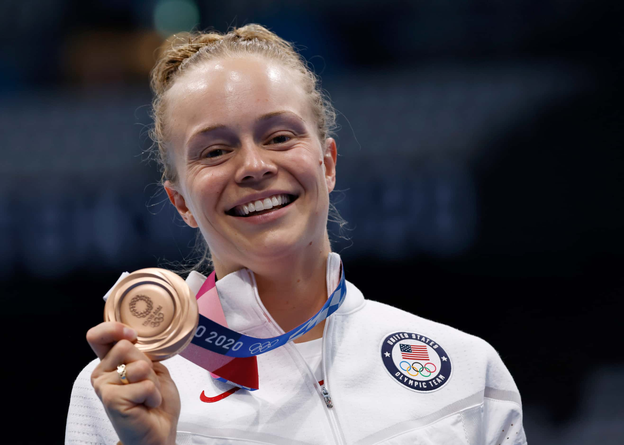 USA’s Krysta Palmer poses for photographers with her bronze medal after competing in the...