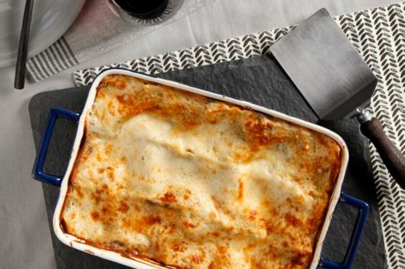 
Portobello Mushroom Lasagna, with slate placemat, cloth placemat, napkin, and plate from...