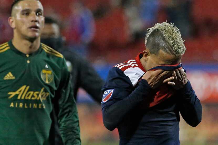 FC Dallas midfielder Michael Barrios (21) reacts emotionally as he heads to the locker room...