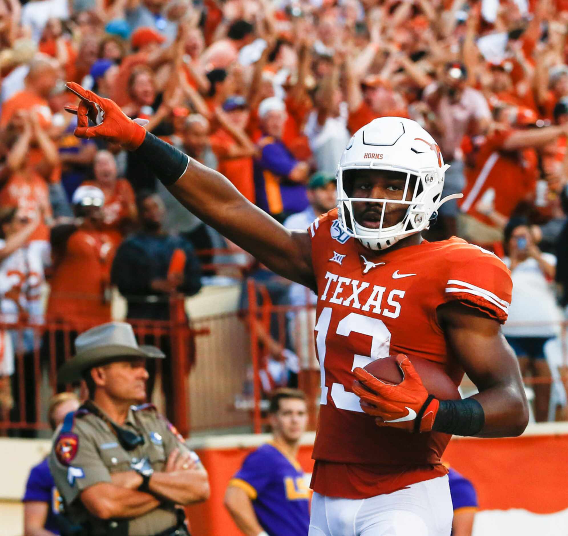 Texas Longhorns wide receiver Brennan Eagles (13) celebrates after scoring during the second...