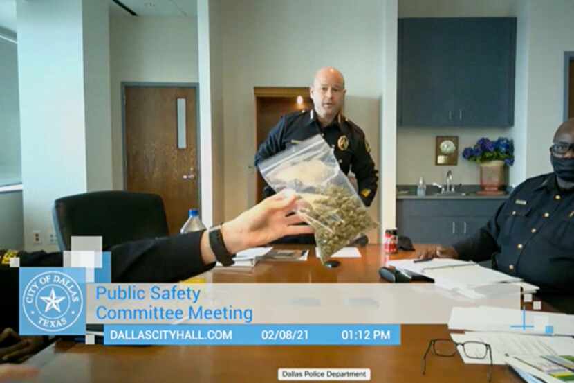 A bag of marijuana is held up during Dallas Police Chief Eddie Garcia's first public safety...