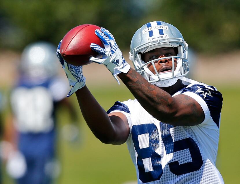 FILE - Cowboys wide receiver Noah Brown (85) catches a pass during organized team activities...