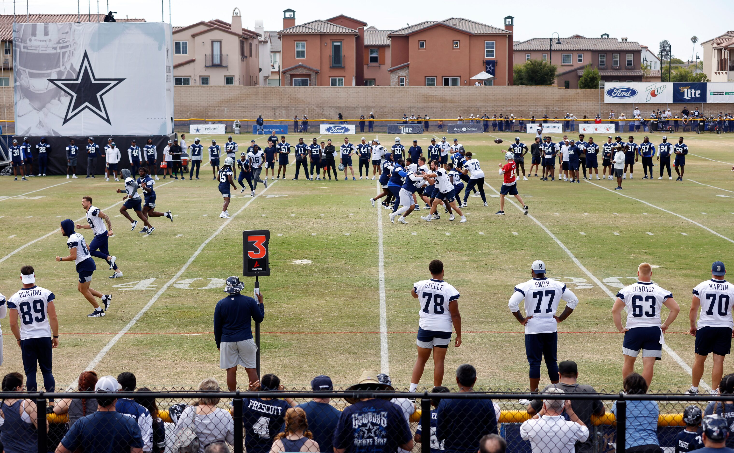 Dallas Cowboys quarterback Cooper Rush (10) throws a pass underneath during a mock game at...