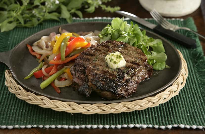 A beautifully grilled ribeye steak.
