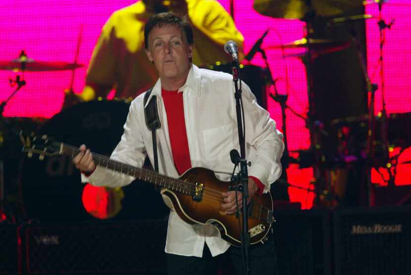 Former Beatle Paul McCartney in concert at Reunion Arena in 2002.