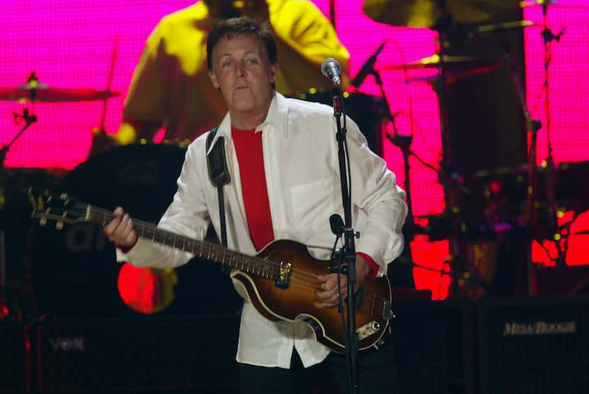 Former Beatle Paul McCartney in concert at Reunion Arena in 2002.