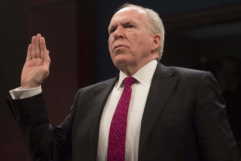 Former CIA Director John Brennan is sworn in before testifying during a House Permanent...