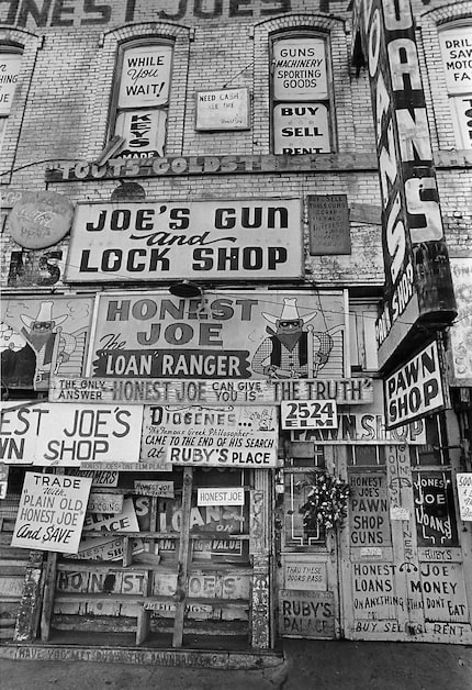 Sep. 8, 1972 - A funeral wreath hangs on the door of Honest Joe's Pawn Shop at 2524 Elm...