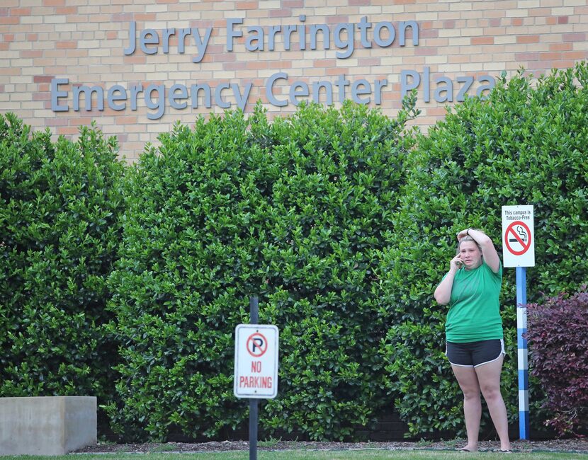 A person who knows the injured Home Depot loss prevention officer stands near the entrance...