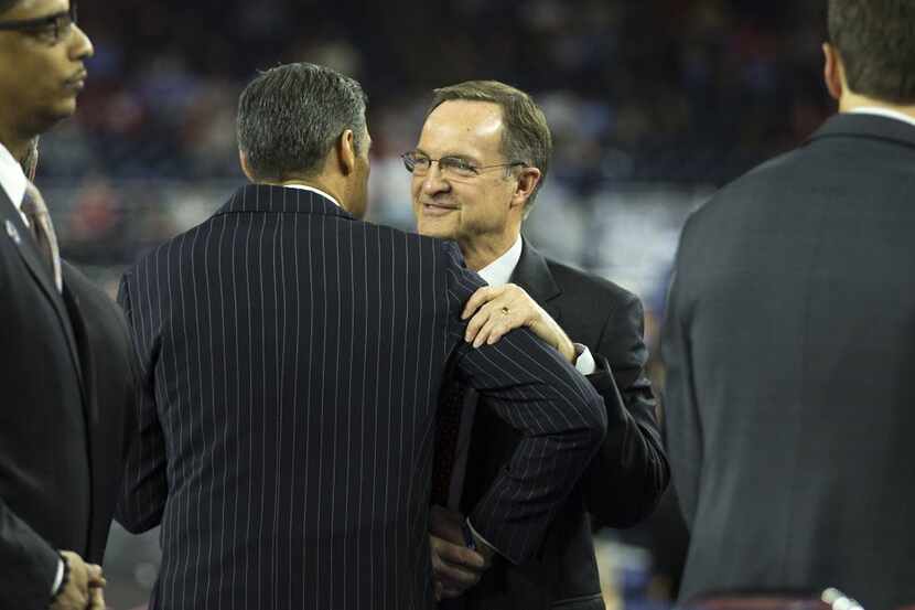 Oklahoma head coach Lon Kruger hugs Villanova head coach Jay Wright before a 2016 NCAA Men's...