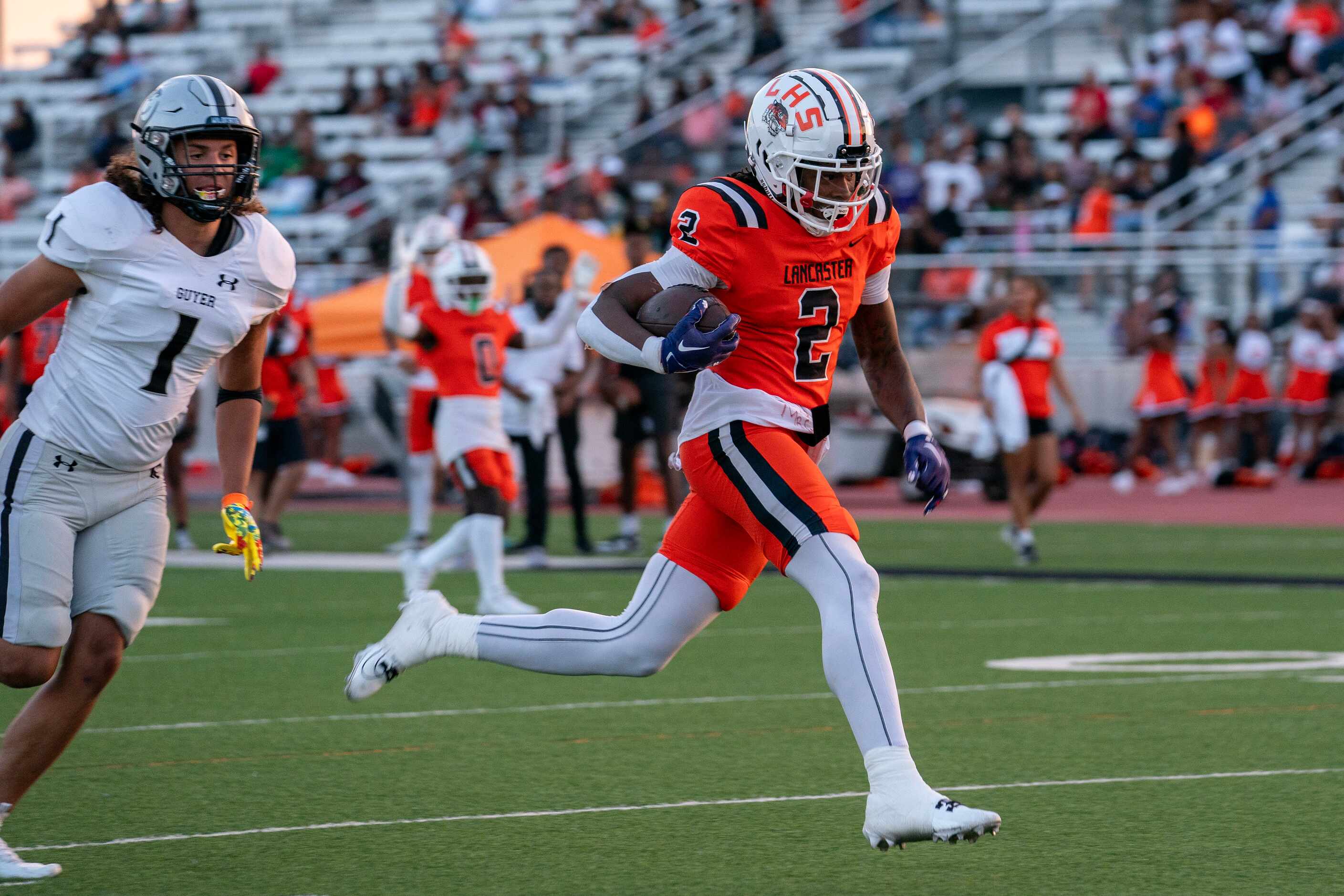 Lancaster senior running back Kewan Lacy (2) runs for a touchdown past Denton Guyer...