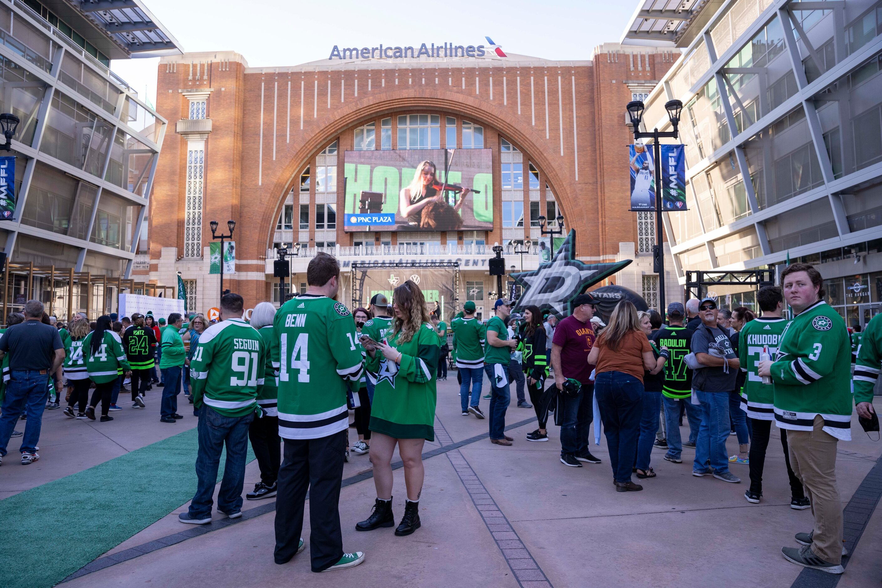 People attend the green carpet event before the start of Dallas Stars home opener against...