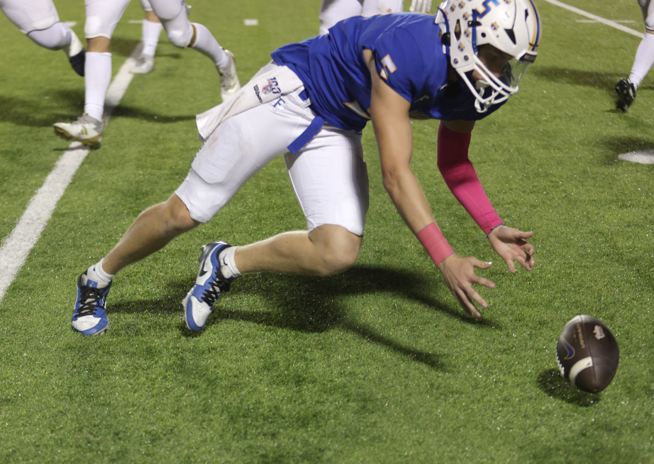 Frisco player #5 Cobyn Harbert chases after a fumble during the Frisco Lone Star High School...