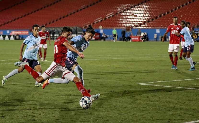 Arturo Rodriguez shoots against Forward Madison in the North Texas SC playoff semifinal....