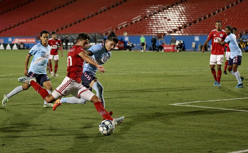 Arturo Rodriguez shoots against Forward Madison in the North Texas SC playoff semifinal....