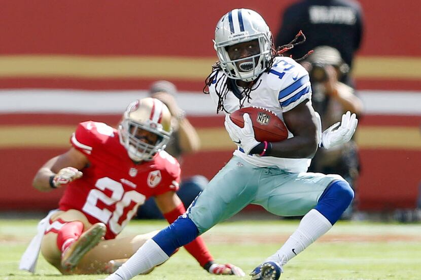 Dallas Cowboys wide receiver Lucky Whitehead (13) attempts to evade San Francisco 49ers long...
