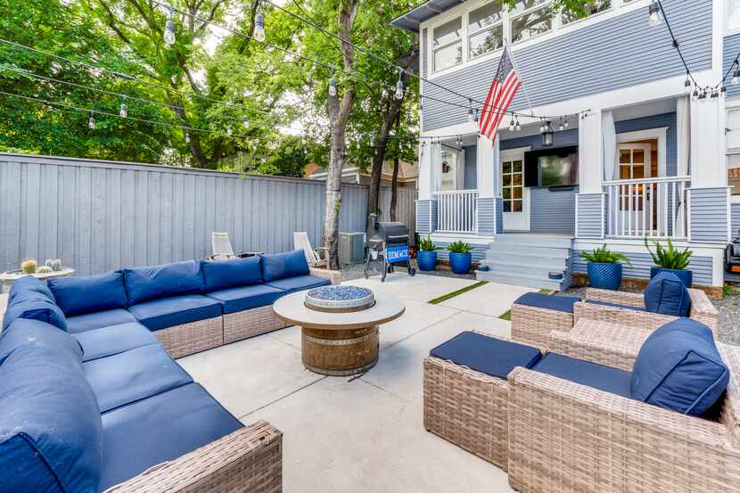 Backyard updates include the addition of multiple seating areas.