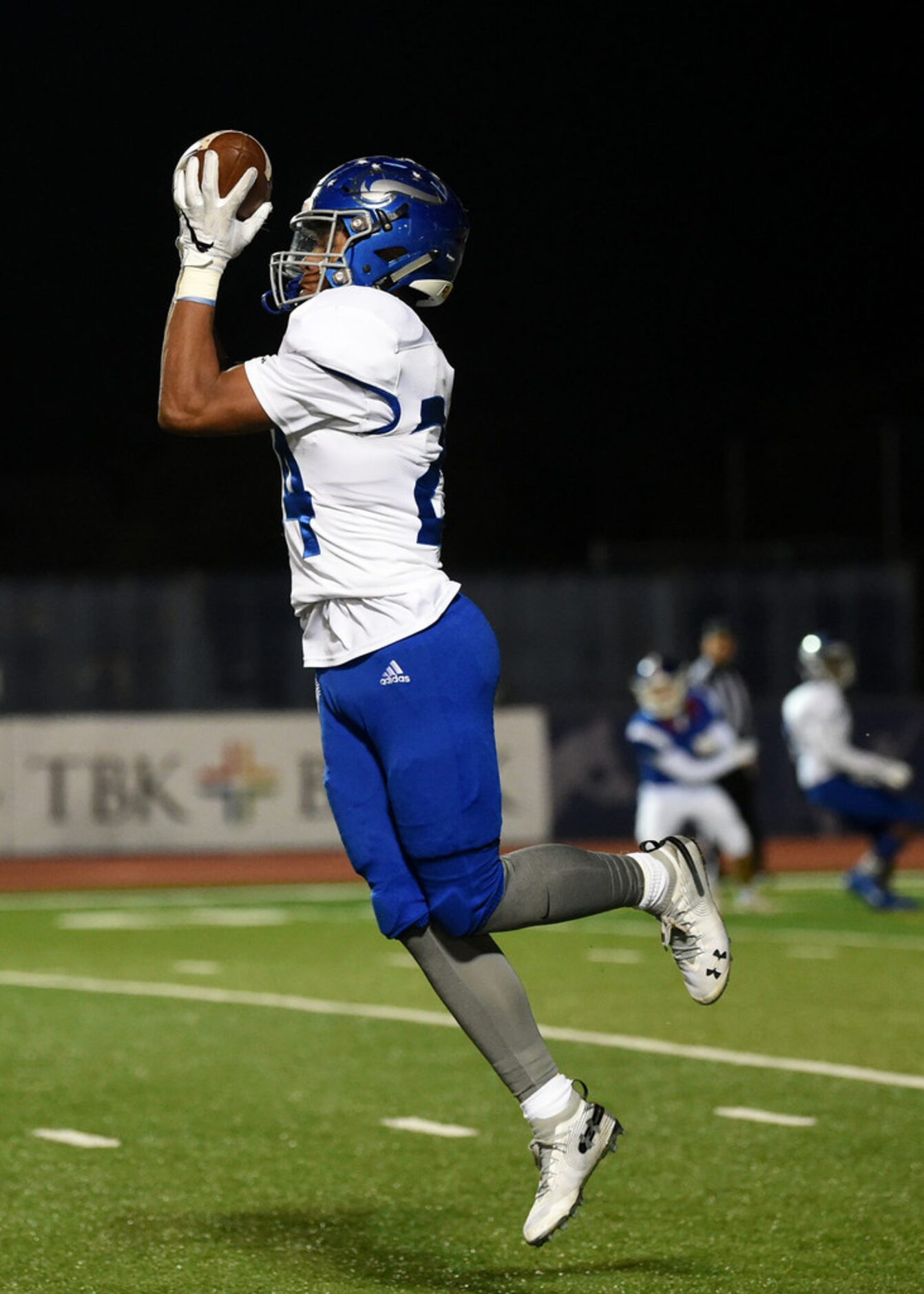 Fort Worth Nolan senior defensive back Jason Kerl (24) intercepts a pass in the second half...