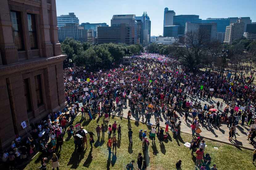 Thousands of demonstrators gather at the Texas state Capitol during the Austin Women's March...