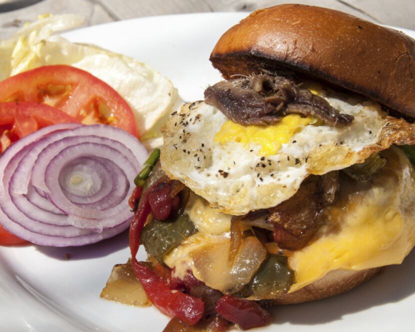 Towering Inferno Burger at Burger Bar & Fish restaurant in Snowmass is topped with  a fried...