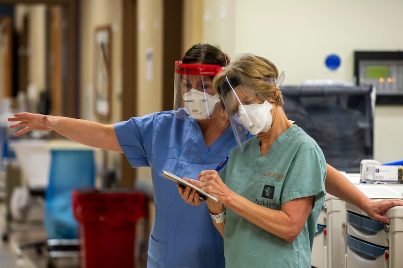 Kathy Doherty, left, among the medical leaders in the COVID tactical care unit in Parkland...