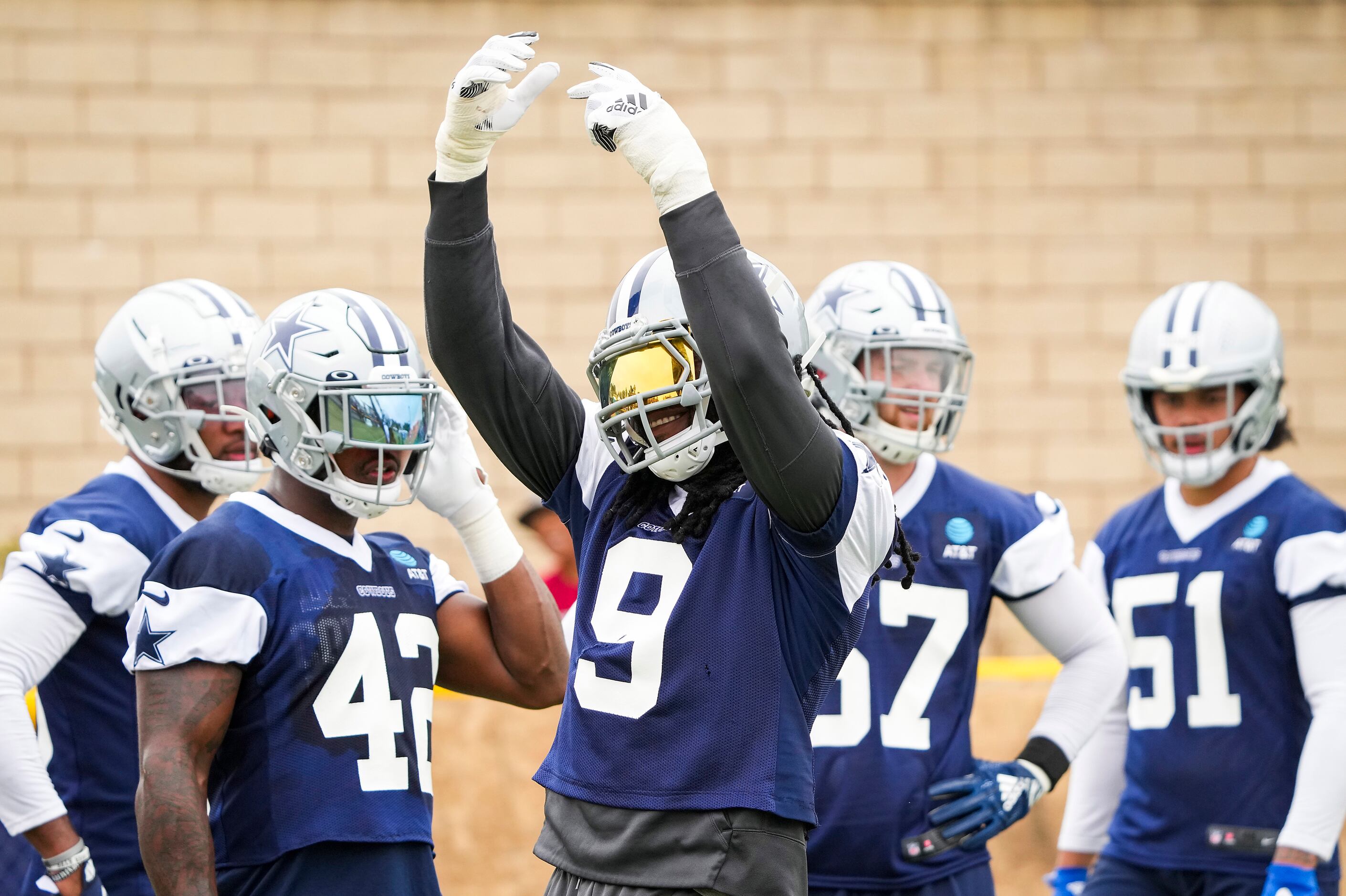 Dallas Cowboys linebacker Jaylon Smith (9) tries to fire up the crowd during a practice at...