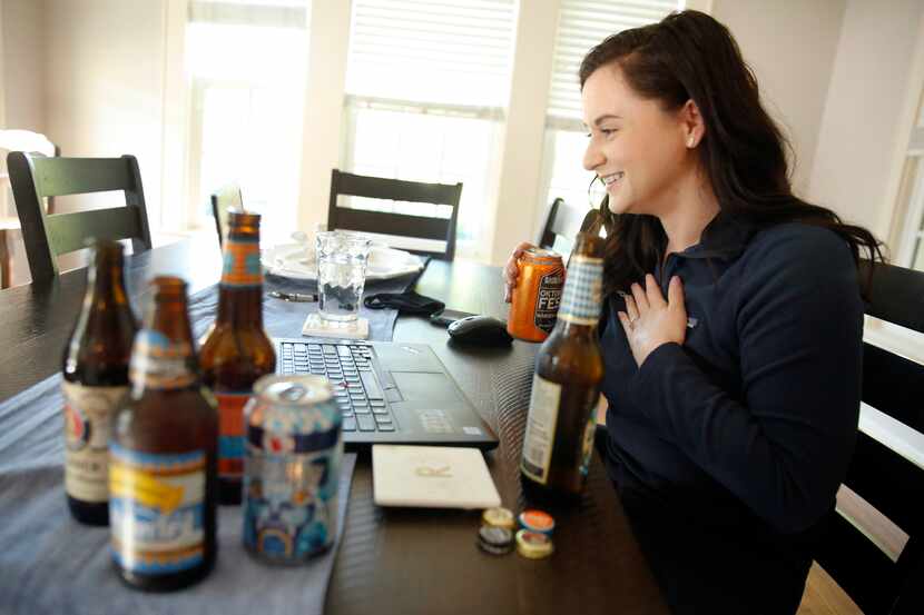 West Monroe Partners senior consultant Kylea Robb tries one of a half dozen seasonal beers...