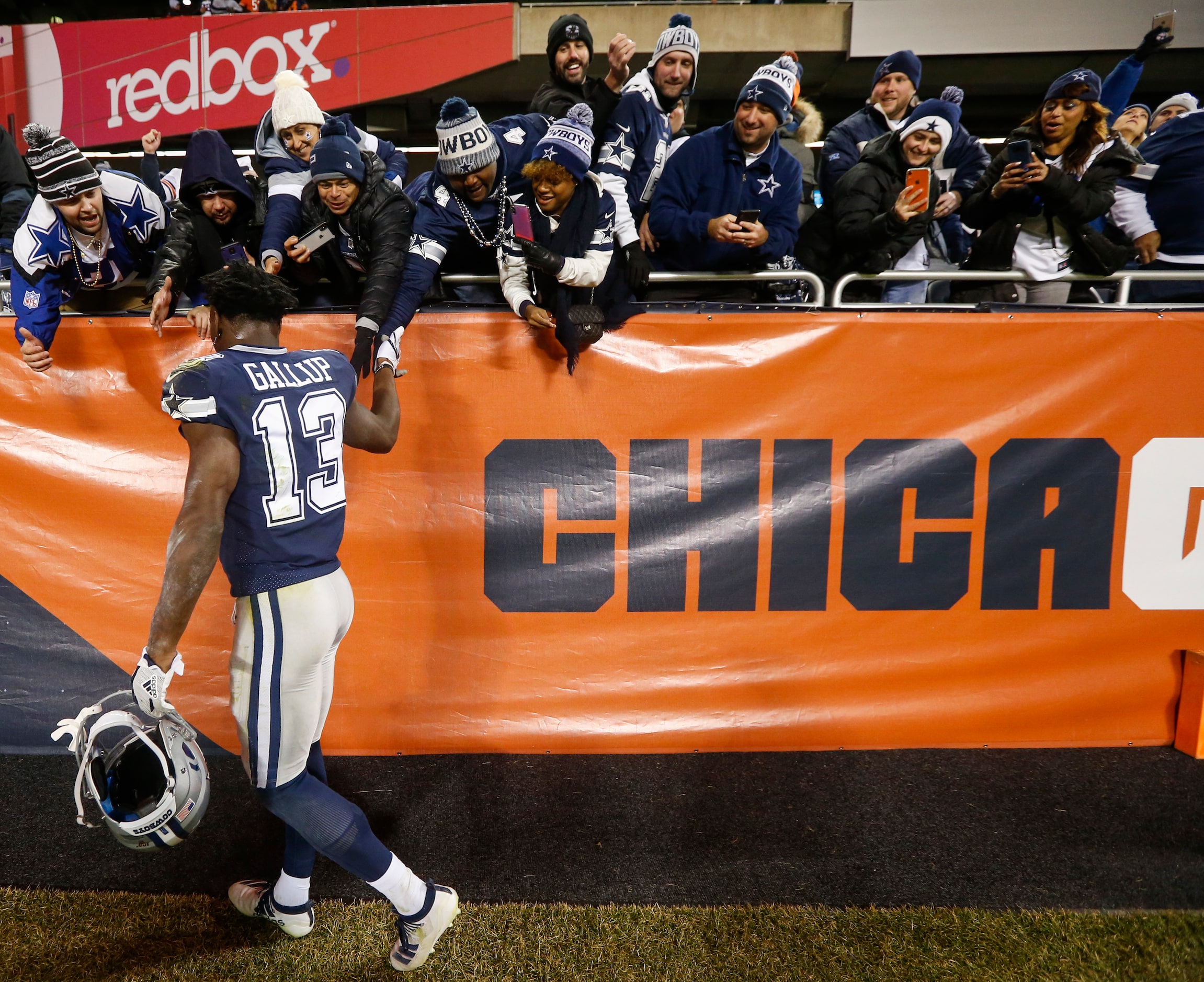 Fans cheer for Dallas Cowboys wide receiver Michael Gallup (13) following a NFL matchup...