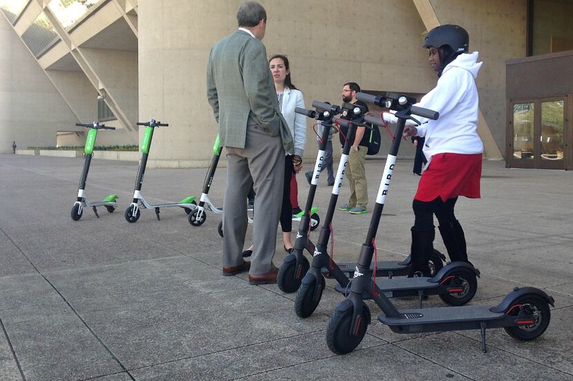 City employees took rides on electric scooters Wednesday.