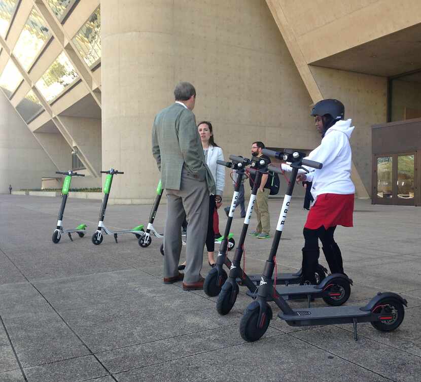 City employees took rides on electric scooters Wednesday.