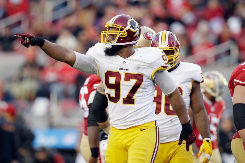 SANTA CLARA, CA - NOVEMBER 23:  Jason Hatcher #97 of the Washington Redskins reacts after he...