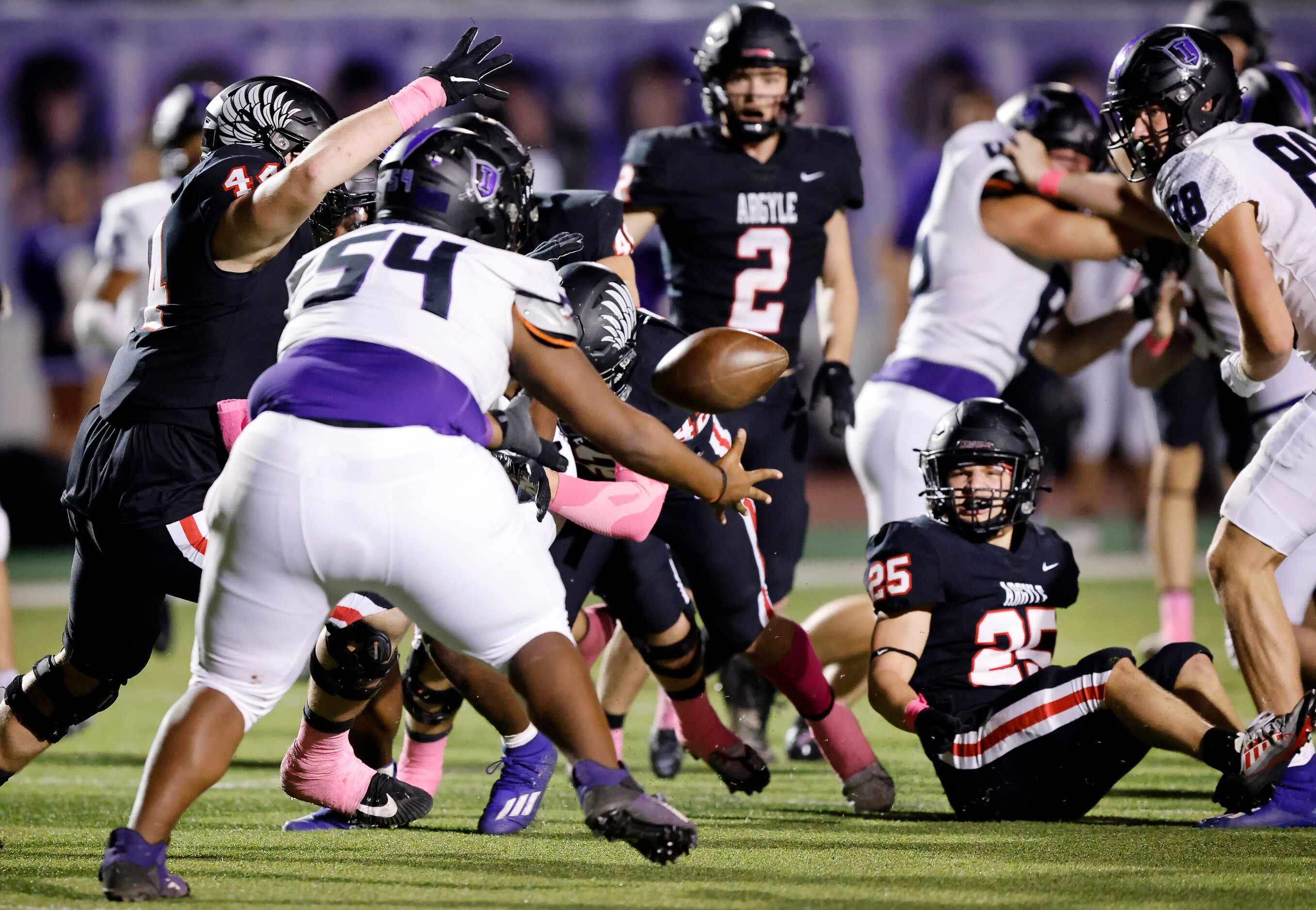 Frisco Independence offensive lineman Jordan Beasley (54) tries to recover Ude Enyeribe’s...