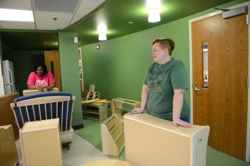 Early childhood development educators Olivia Ballard  (left) and Jennifer Smith discuss...