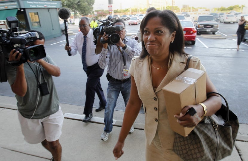 Dapheny Fain walks to the Dallas County administration building in 2011.