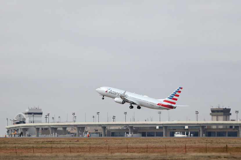 An American Airlines plane takes off at Dallas/Fort Worth International Airport on Tuesday,...