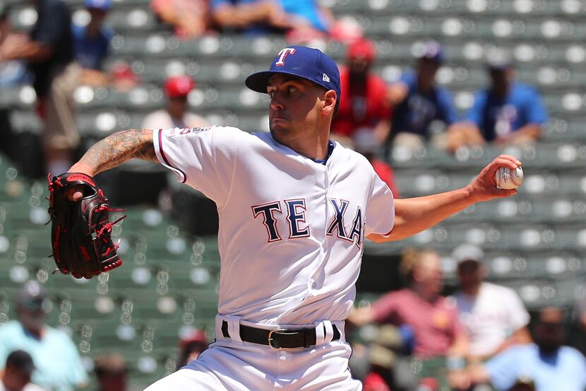 ARLINGTON, TEXAS - JUNE 08: Joe Palumbo #62 of the Texas Rangers pitches in the second...