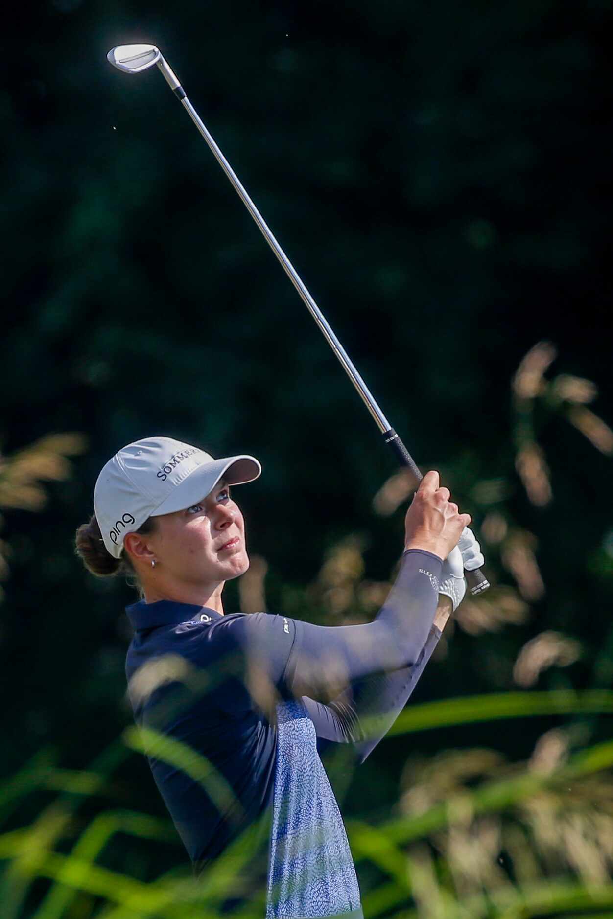 Professional golfer Esther Henseleit eyes her shot along the No. 12 fairway during the final...