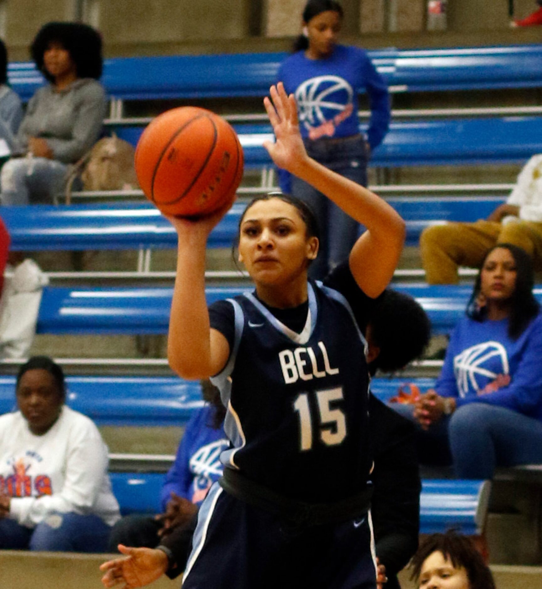 Hurst L.D. Bell guard Myra Gordon (15) puts up a shot during first half action against...