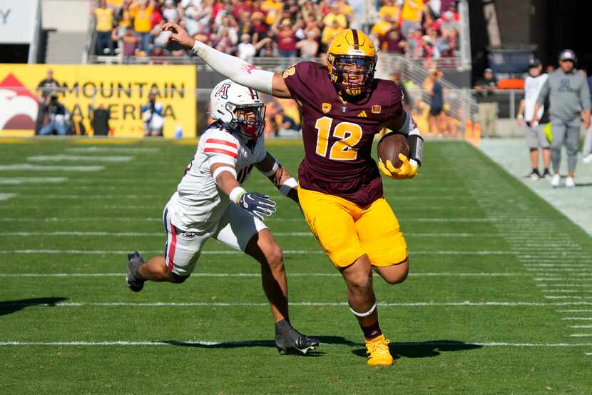 Arizona State tight end Jalin Conyers (12) carries the ball in front of Arizona linebacker...