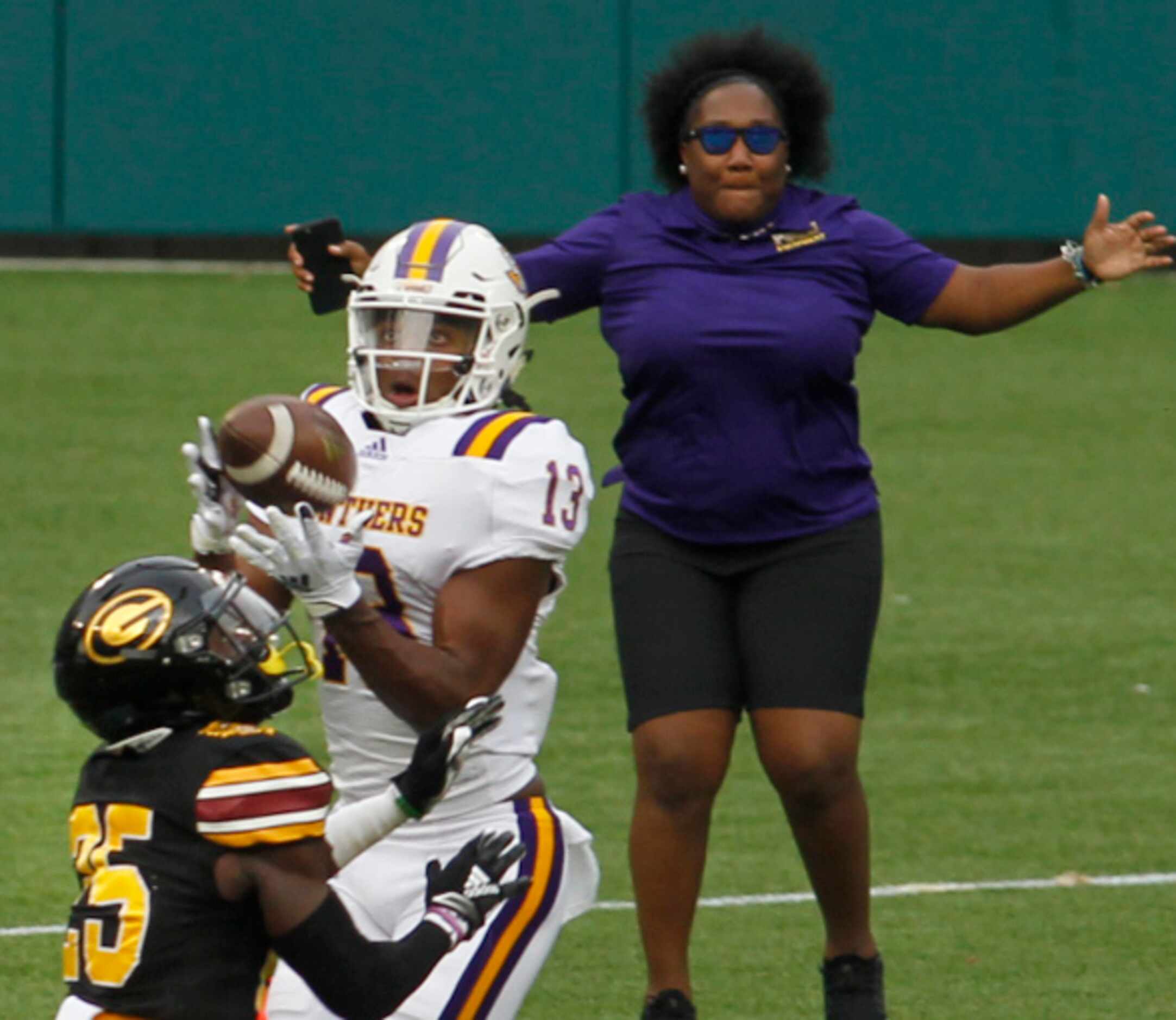 Prairie View A&M receiver Travis O'Connor (13) pulls in a long reception to the delight of a...