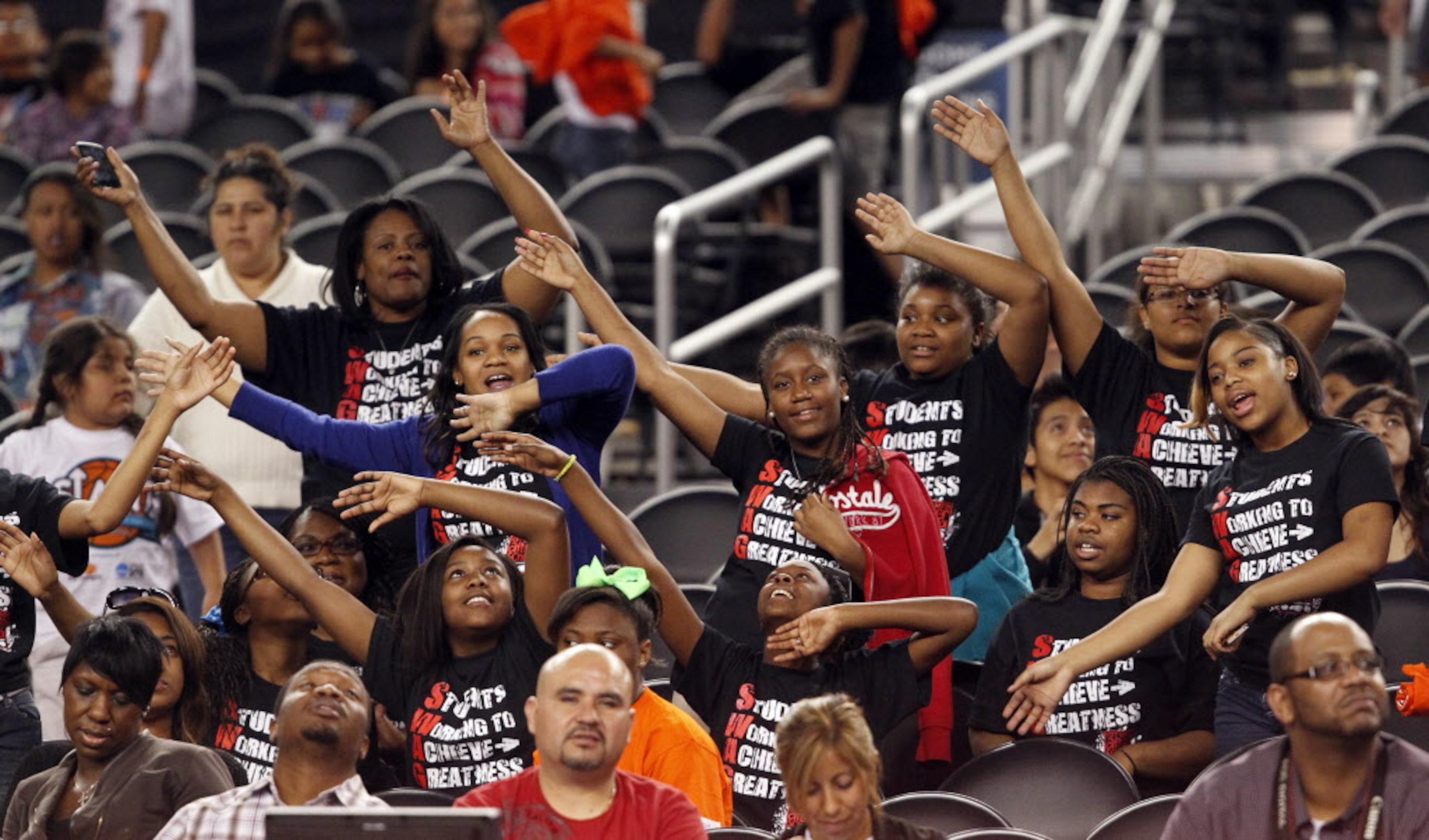 Fans dance as Carly Rose Sonenclar performs during the Reese's Final Four Slant Celebration...