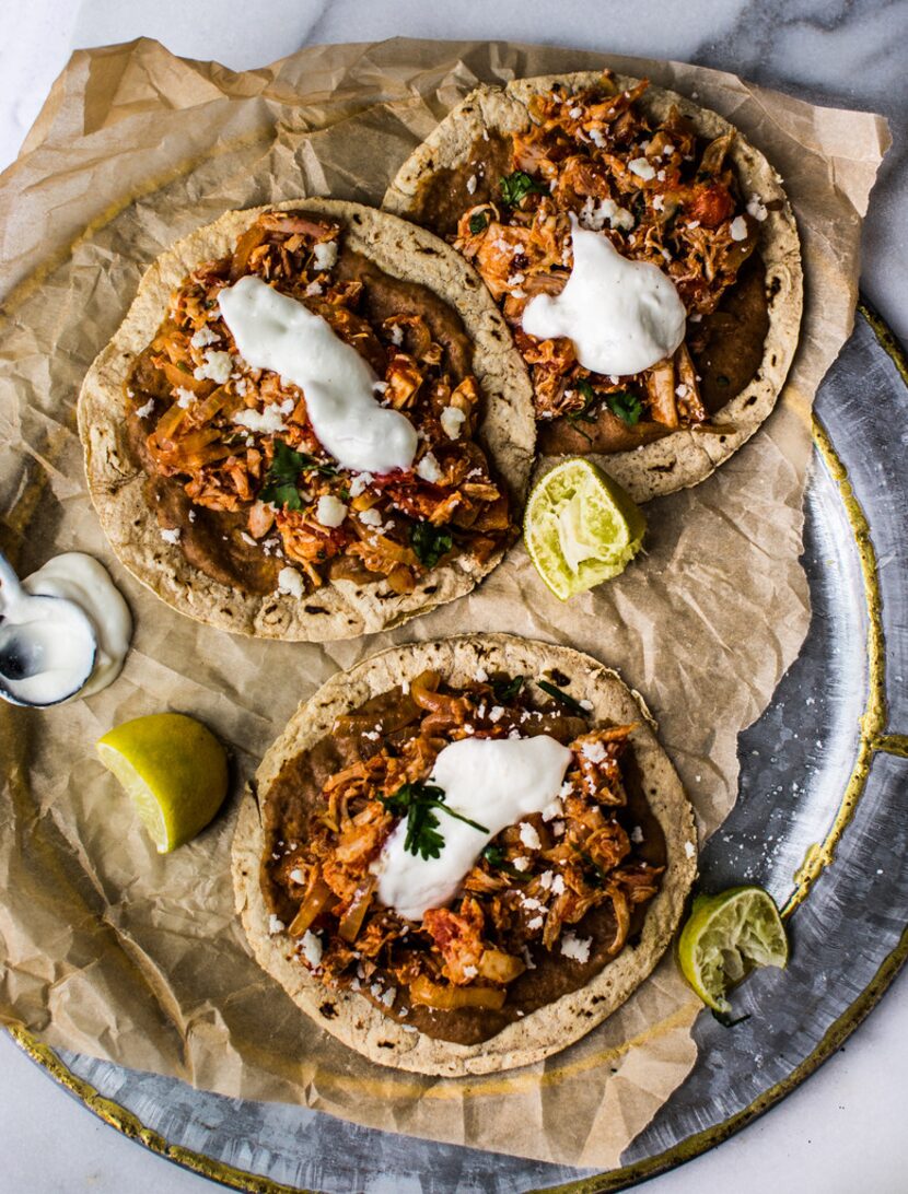 Tostadas de Tinga Poblana from Nopalito, written by Chef Gonzalo Guzmán and journalist Stacy...